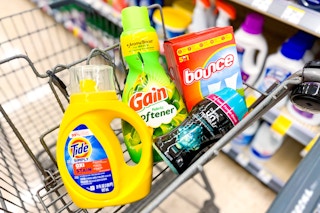 tide simply, bounce, downy, and gain products in a walgreens shopping cart