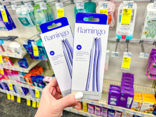 hand holding flamingo dermaplaning razors in cvs