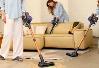 people cleaning a room and couch with cordless stick vacuums