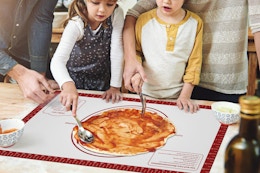 kids making food on a silicone baking mat