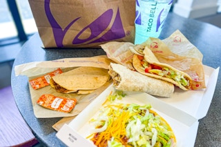 a table full of taco bell decade foods 