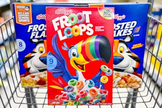 three boxes of cereal in shopping cart