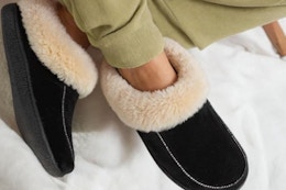 a woman wearing house slippers