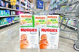 huggies diapers and wipes stacked in store floor