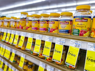 nature made vitamins with buy one, get one free signs