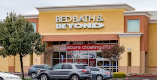 A Bed Bath & Beyond store with a Store Closing sign