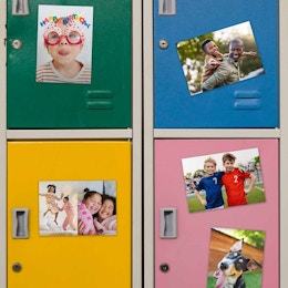 Five Walgreens photo magnets on fourn locker doors.