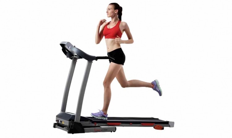 Woman running on treadmill