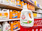 arm & hammer laundry detergent bottle sitting on top a target cart