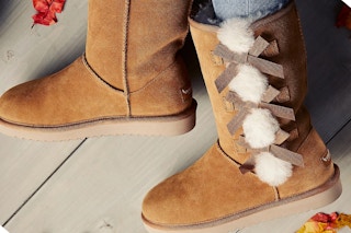 Woman wearing a pair of tall Koolaburra by Ugg boots