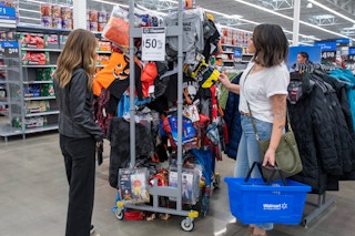 Women looking at Halloween Clearance in Walmart