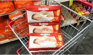 three huggies little snugglers packs inside shopping cart