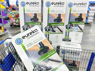 Eureka airspeed vacuum in cart and on shelf