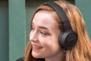 Woman wearing the JBL Tune Wireless Bluetooth Headphones.