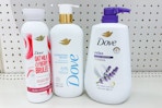 three dove body washes on a store shelf