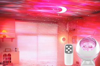B0D6F7WM5S Aurora Star Projector colorful lights and white stars projected onto a bedroom's walls and ceiling + remote control