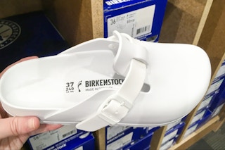 birkenstock shoe eva clog held infront of display