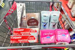 covergirl makeup, colgate toothpaste, degree deodorant, and carefree liners in a cart