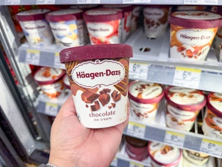 hand holding haagen dazs ice cream in walgreens