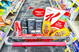 colgate toothpaste, axe body wash, nivea body wash, maybelline makeup, garnier shampoo, and special k cereal in a cart