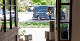 an amazon delivery person delivering a package
