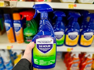 walmart microban multi-purpose cleaner hand holding