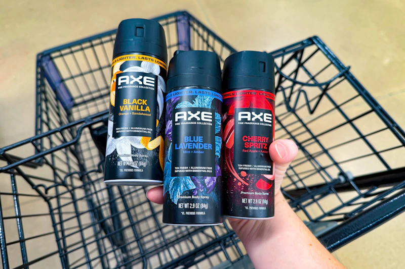hand holding axe body sprays over cart