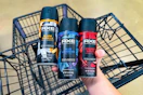 hand holding axe body sprays over cart