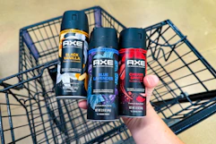 hand holding axe body sprays over cart
