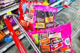 bags of halloween candy in a cart