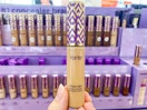 hand holding tube of tarte shape tape concealer in ulta