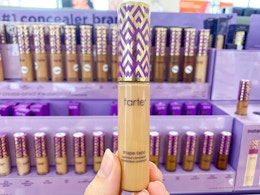 hand holding tube of tarte shape tape concealer in ulta