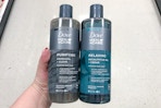 hand holding dove men+care body wash