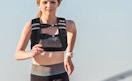 a person running with a weighted vest