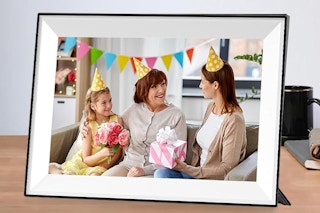 a digital picture frame on a table