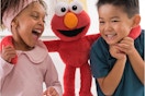 kids playing with elmo