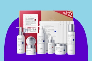 NING DERMOLOGIE Skin Care Set on a blue background.