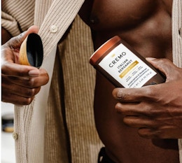 a person using a stick of deodorant 