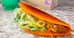 Every Crazy Fact About the Doritos Locos Tacos card image