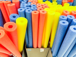 sun squad pool noodles sitting on a target shelf