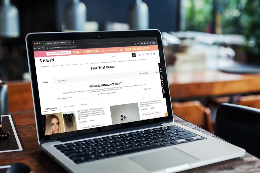 a laptop displaying the Shein Free Trial Center webpage