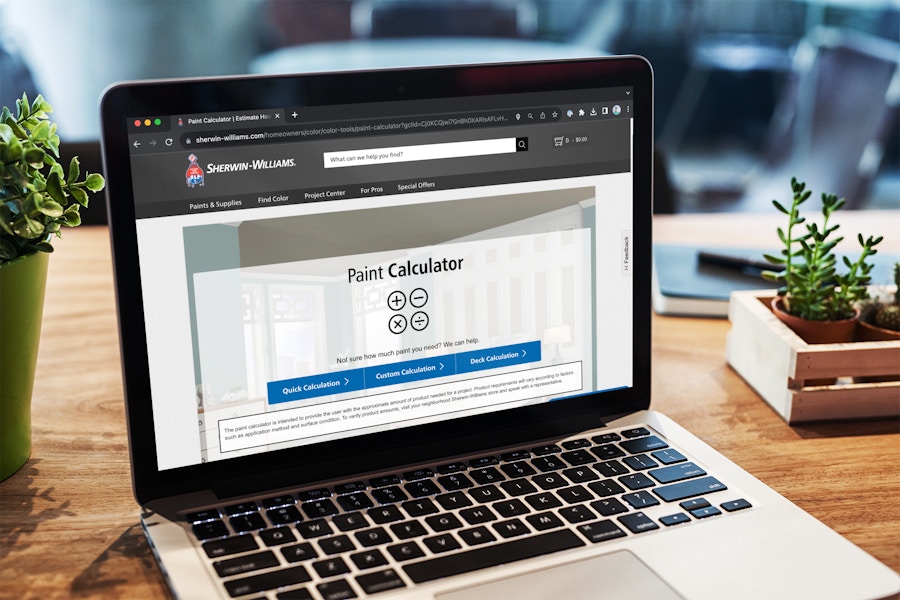 a laptop displaying the paint calculator webpage on the Sherwin Williams website
