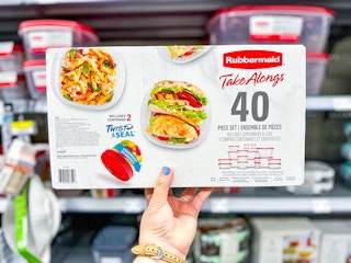 hand holding rubbermaid takealongs at walmart