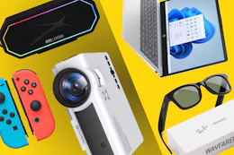 Altec speaker, switch remotes, projector, HP laptop, Rayban Meta glasses