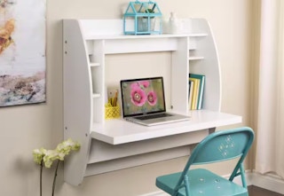 white floating desk on a beige wall