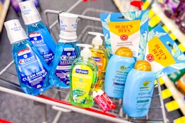 crest mouthwash, softsoap hand soap, nivea lip balm, ogx shampoo, and burts bees sheet masks in a cart