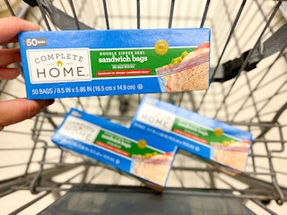 hand holding complete home box of sandwhich bags