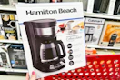 hamilton beach coffee maker sitting on top a target cart