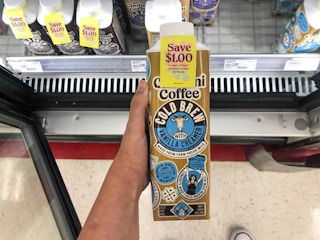 hand holding chobani coffee at target