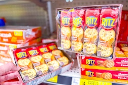 hand holding ritz peanut butter crackers